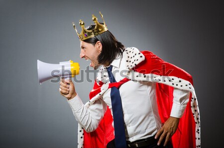 Man with axes in funny concept Stock photo © Elnur