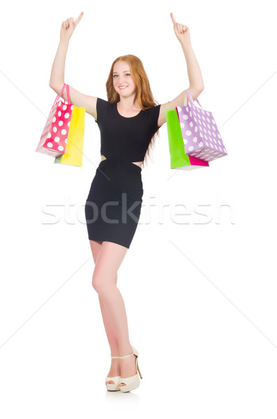 Woman after shopping spree on white Stock photo © Elnur
