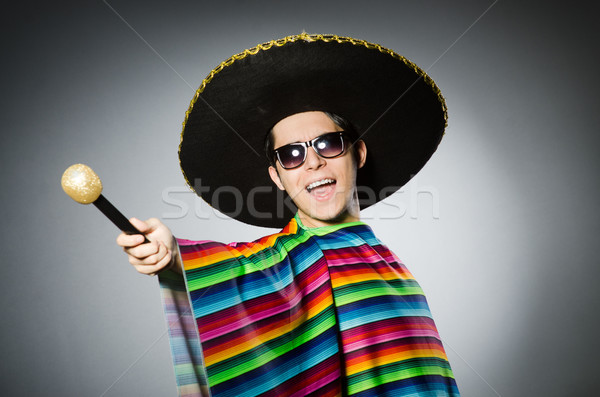 Stock photo: Funny mexican singing in karaoke