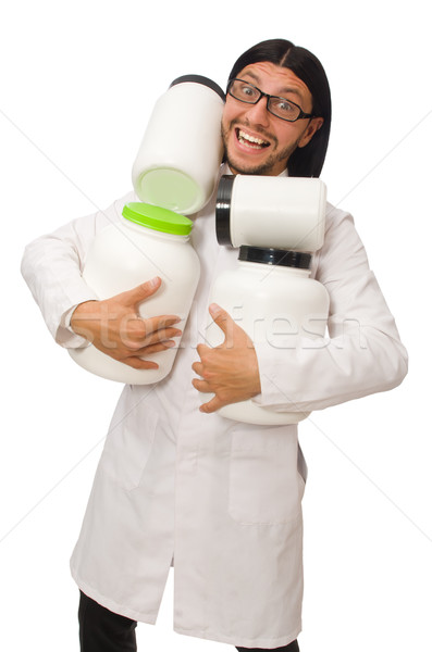 Funny doctor with protein jars isolated on white Stock photo © Elnur