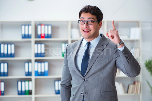 Businessman in the office working with laptop Stock photo © Elnur