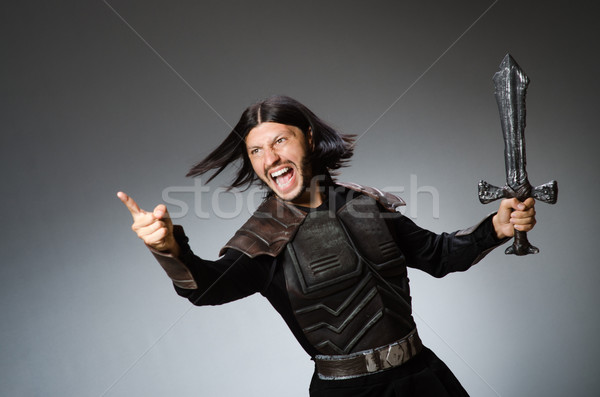 Enojado caballero espada oscuro hombre metal Foto stock © Elnur
