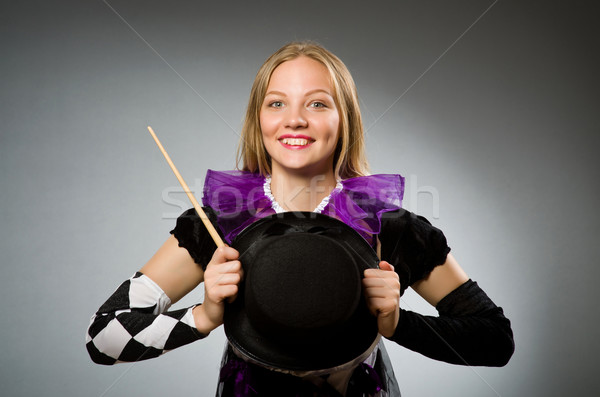 Woman magician doing her tricks with wand Stock photo © Elnur