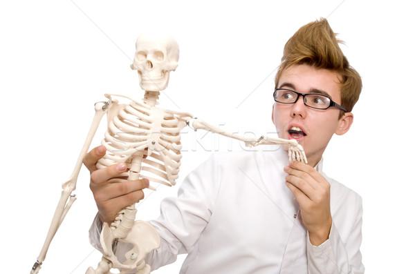 Funny doctor with skeleton isolated on white Stock photo © Elnur