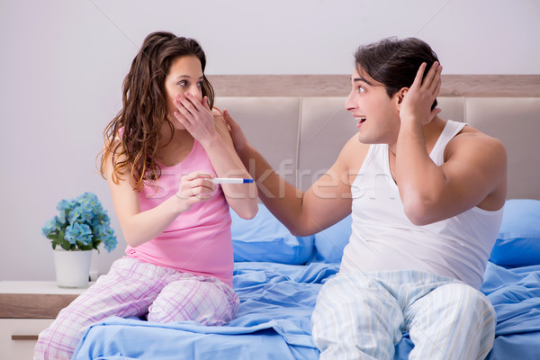 Stock photo: Happy couple finding out about pregnancy test results