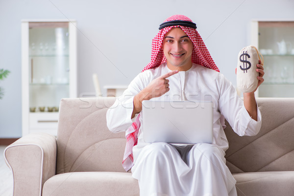Arab businessman working sitting at couch Stock photo © Elnur