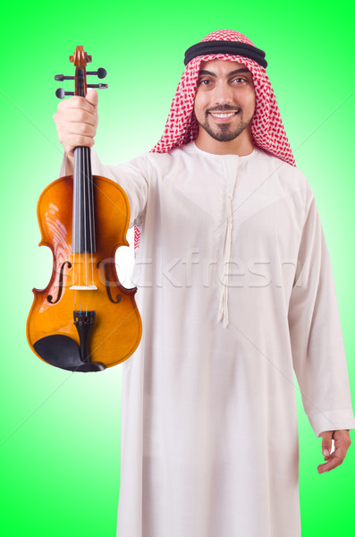 Arab man playing music on white Stock photo © Elnur