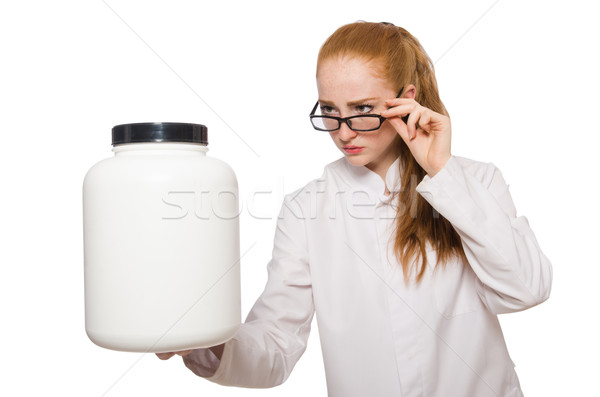 Young female doctor holding jar of protein isolated on white Stock photo © Elnur