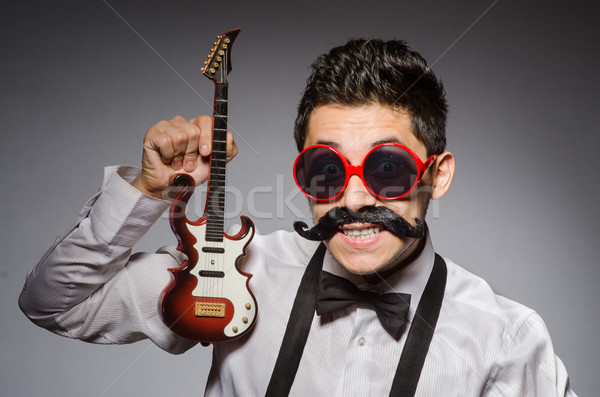 Drôle homme mini guitare fête fond [[stock_photo]] © Elnur