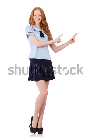 Young naughty student  female pointing isolated on white Stock photo © Elnur