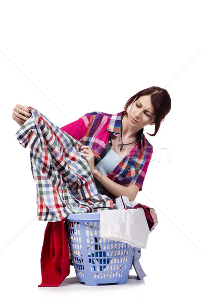 Woman tired after doing laundry isolated on white Stock photo © Elnur
