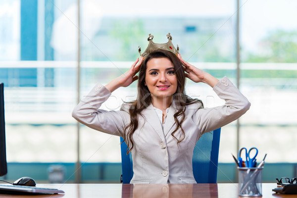 Businesswoman sitting at the office desk Stock photo © Elnur