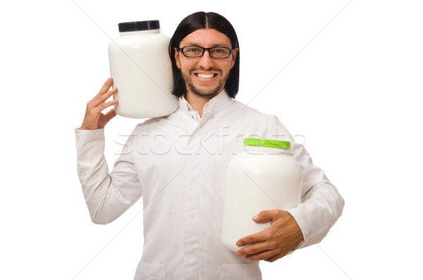 Stock photo: Funny doctor with protein jars isolated on white