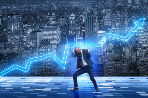 Businessman supporting increase in economy Stock photo © Elnur