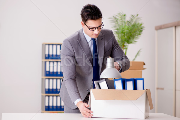 Businessman moving offices after promotion Stock photo © Elnur