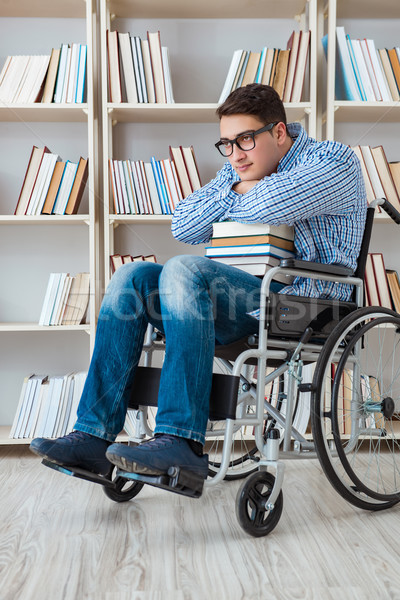Disabled student studying in the library Stock photo © Elnur