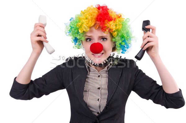 Businessman with clown wig isolated on white Stock photo © Elnur