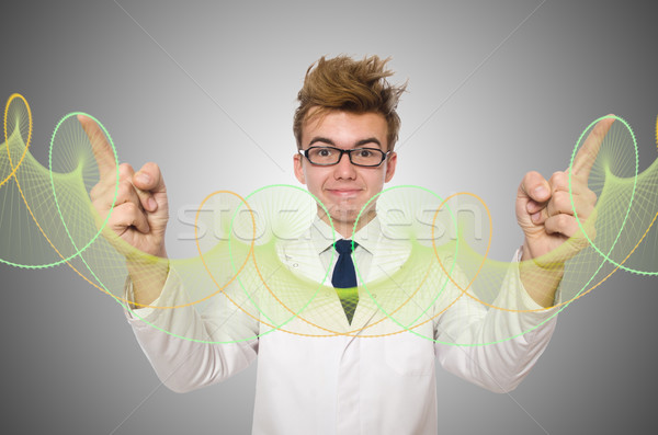 Funny doctor pressing virtual buttons Stock photo © Elnur