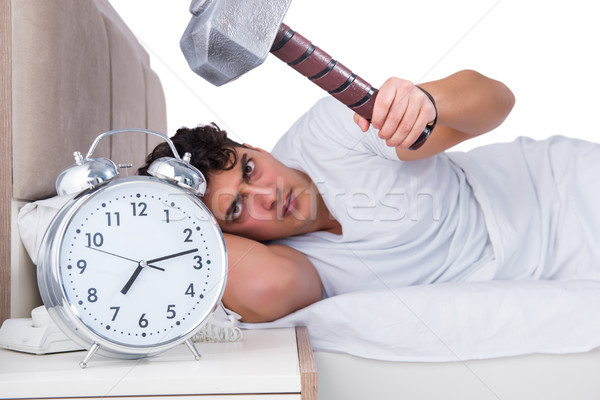 Uomo letto sofferenza insonnia clock sonno Foto d'archivio © Elnur
