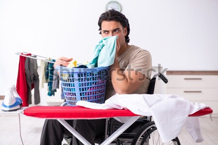 Szomorú nő vasalás ruházat otthon lány Stock fotó © Elnur