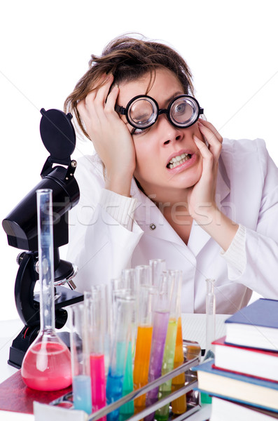 Crazy woman chemist in lab Stock photo © Elnur