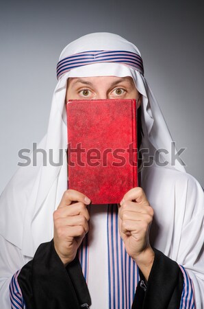 Arab man with red sticks of dynamite Stock photo © Elnur