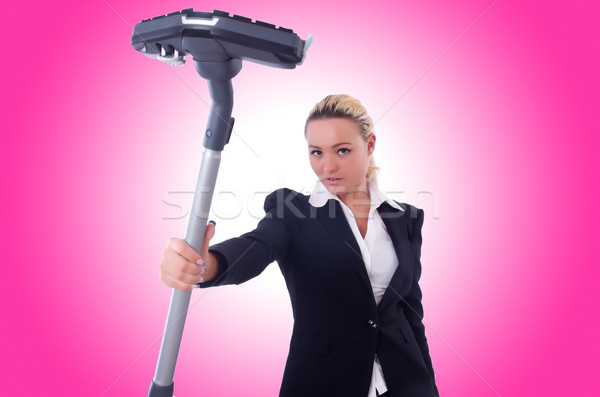 Businesswoman with vacuum cleaner on white Stock photo © Elnur