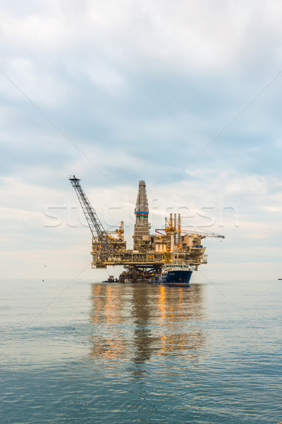 Oil rig platform in the calm sea Stock photo © Elnur