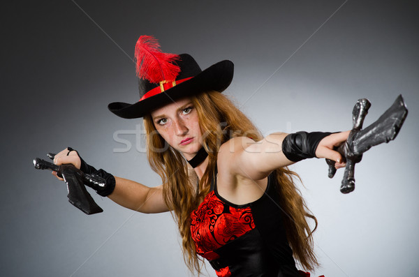 Woman pirate with sharp weapon Stock photo © Elnur