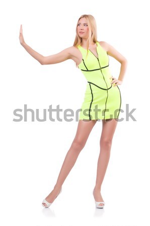 Pretty tall woman in short yellow dress isolated on white Stock photo © Elnur