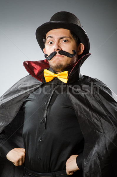 Funny magician man wearing tophat Stock photo © Elnur