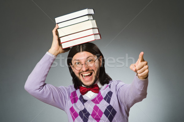Young student with book in learning concept Stock photo © Elnur