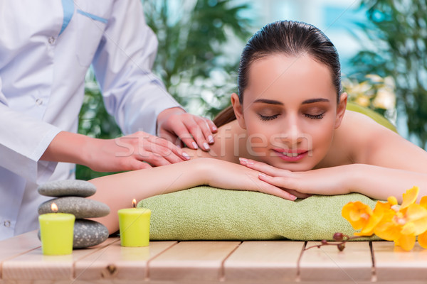 Young woman during massage session Stock photo © Elnur