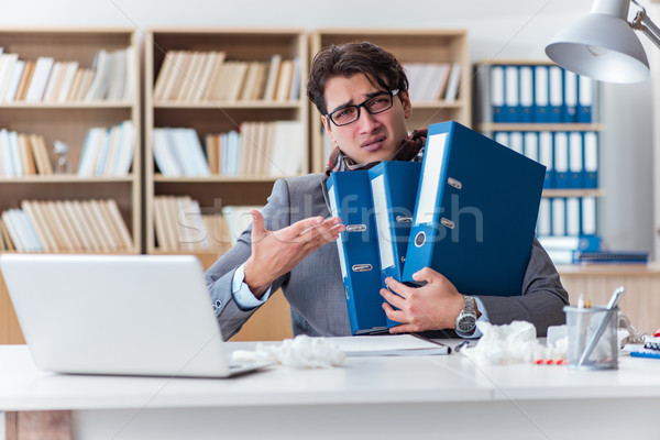 Sick businessman suffering from illness in the office Stock photo © Elnur