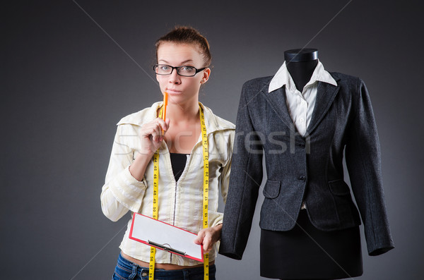 Woman tailor working on clothing Stock photo © Elnur