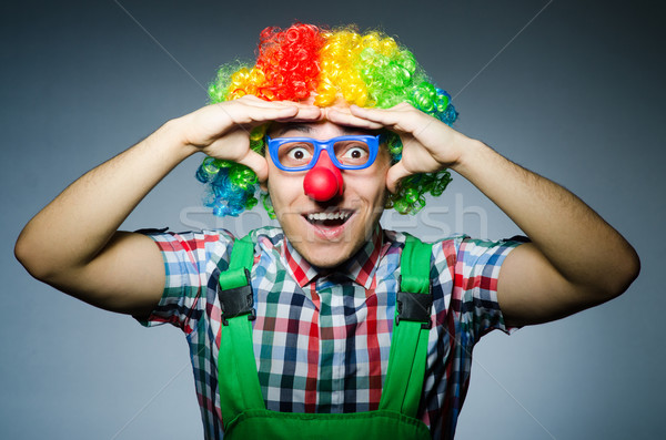 Funny clown against the dark background Stock photo © Elnur