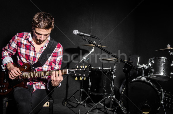 Człowiek gitara koncertu muzyki strony tle Zdjęcia stock © Elnur
