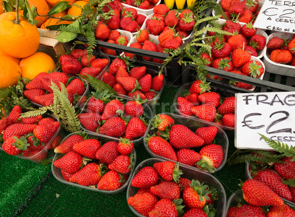 Strawberries in boxes as healthy food on sale Stock photo © Elnur