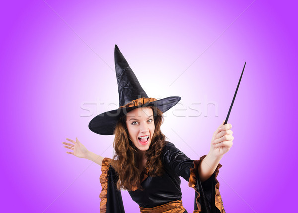 Witch with wand against the gradient  Stock photo © Elnur