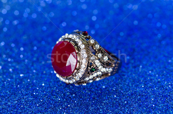 Jewellery ring against blue background Stock photo © Elnur