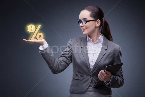 Businesswoman in high interest rates concept Stock photo © Elnur