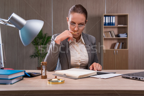 The businesswoman working in the office Stock photo © Elnur
