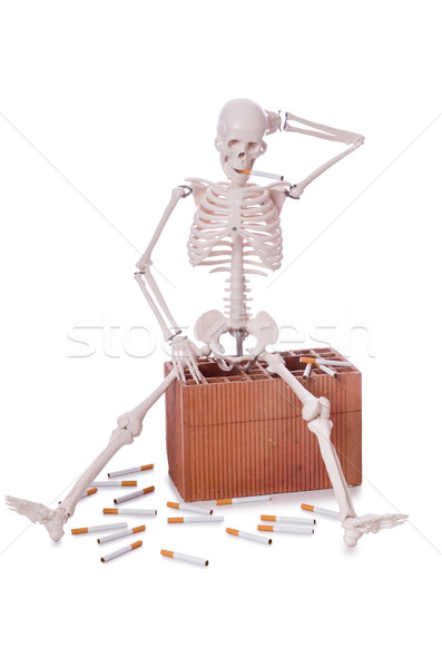 Antismoking concept with cigarettes and skull Stock photo © Elnur