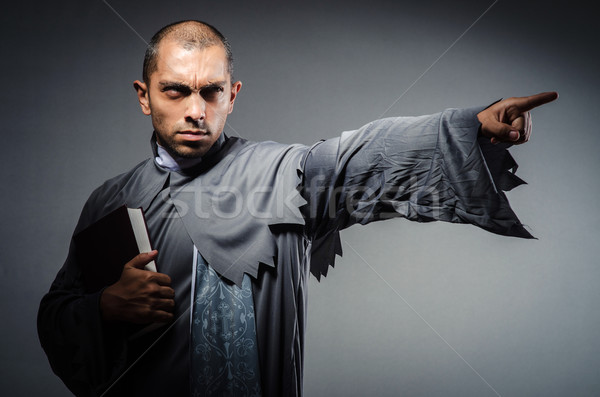 Young priest isolated on the white Stock photo © Elnur
