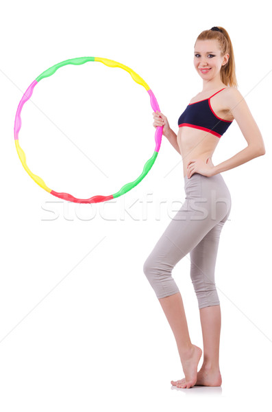 Woman doing exercises with hula hoop Stock photo © Elnur