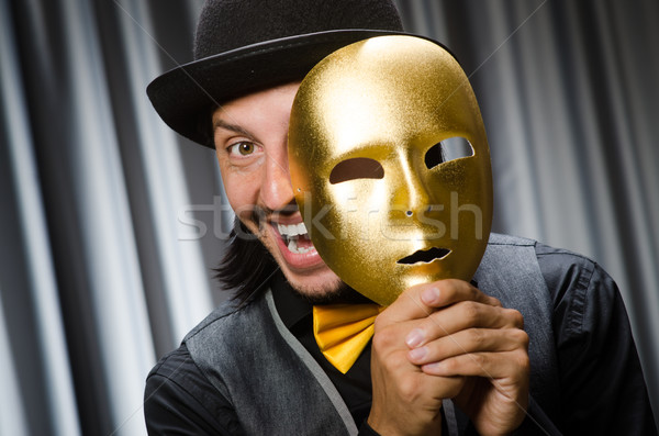 Funny concept with theatrical mask Stock photo © Elnur