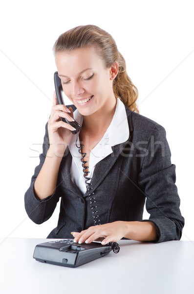 Pretty office manager speaking on the phone isolated on white Stock photo © Elnur