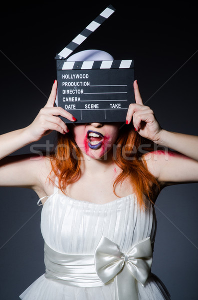 Satan halloween concept with movie clapper board Stock photo © Elnur