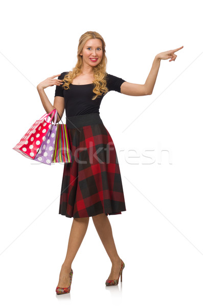 Stock photo: Beautiful young woman in plaid dress isolated on white