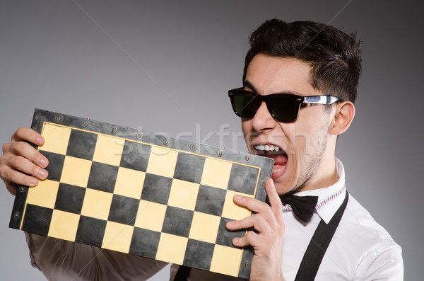 Funny chess player with board Stock photo © Elnur